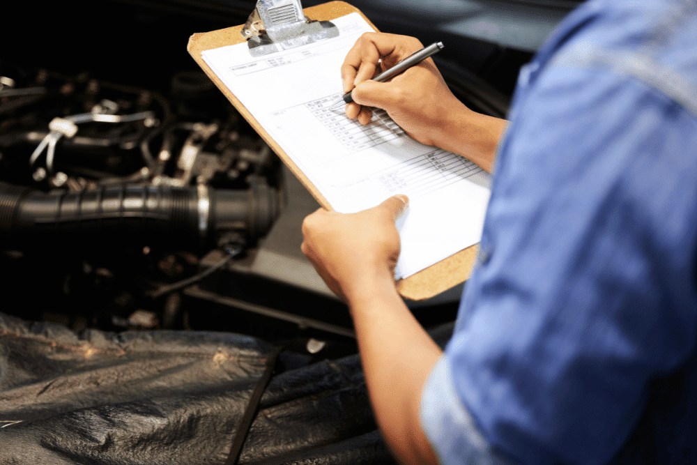 Digital Vehicle Inspections in Castle Rock, CO by Titan Auto Tech, Mechanic doing an inspection on a vehicle