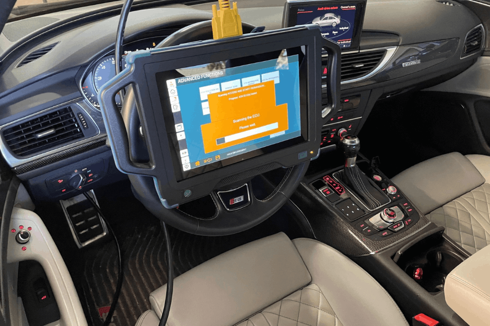 Car diagnostic, European auto repair in Castle Rock, CO at Titan Auto Tech European & Import Auto Repair. Image of a diagnostic scan tool connected inside an Audi S6 while scanning the ECU to support accurate troubleshooting and reliable performance.